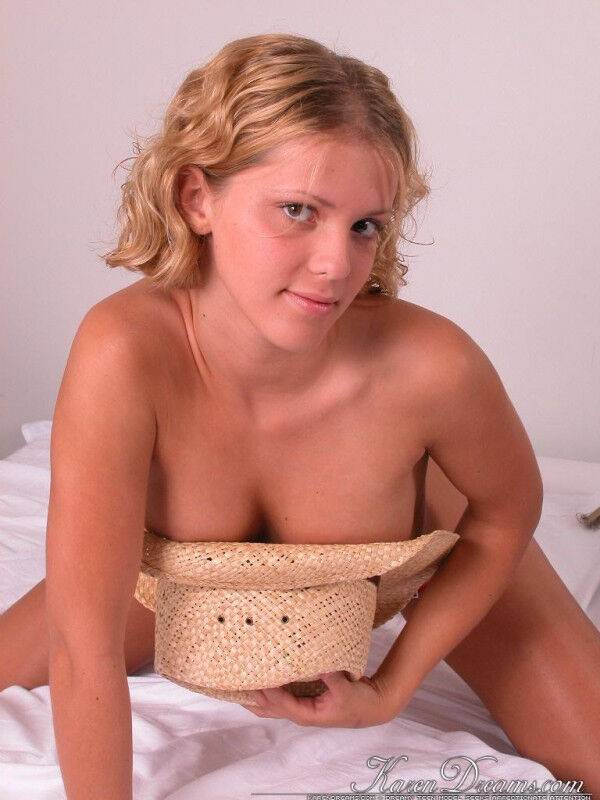 Young blonde Karen covers up her naked breasts with a straw hat in SFW action - #6