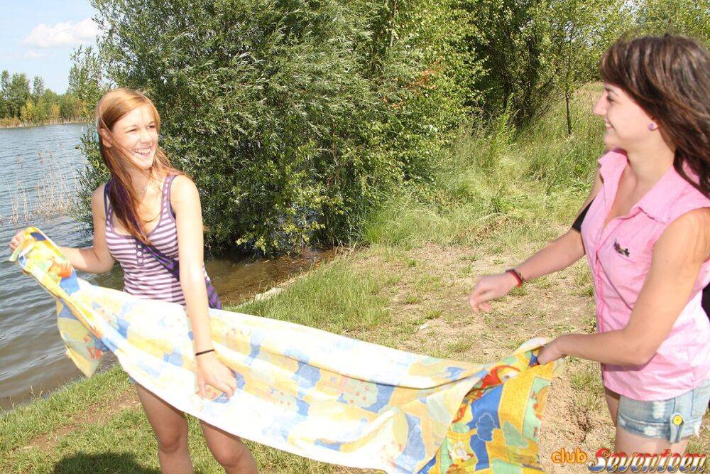 Young lesbians grind their twats together on a blanket down by the lake - #2