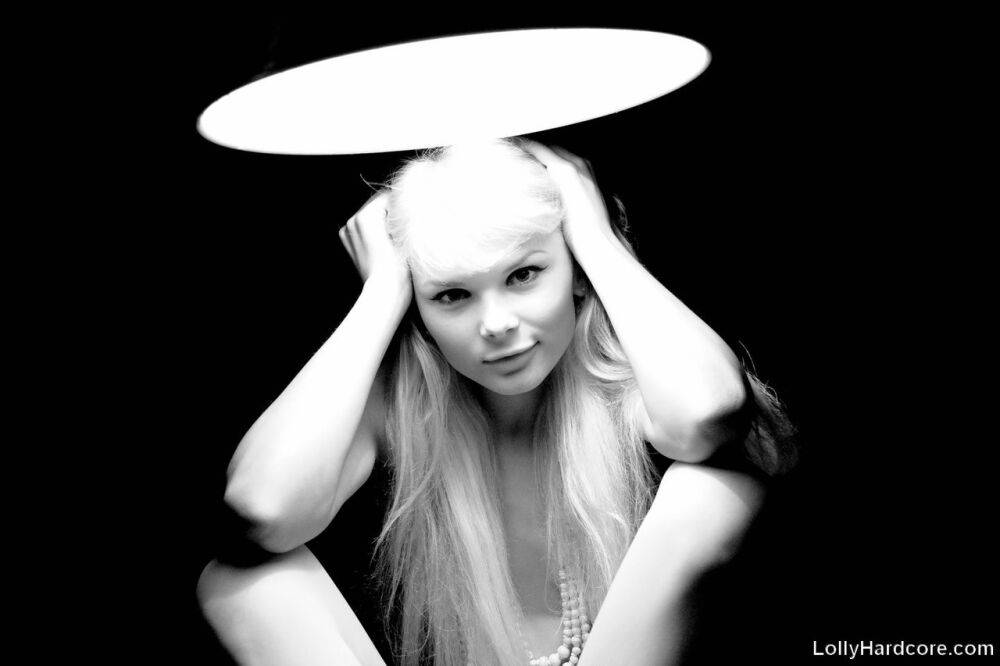 Hot blonde teen Lolly strikes sexy solo poses during a black and white shoot - #13