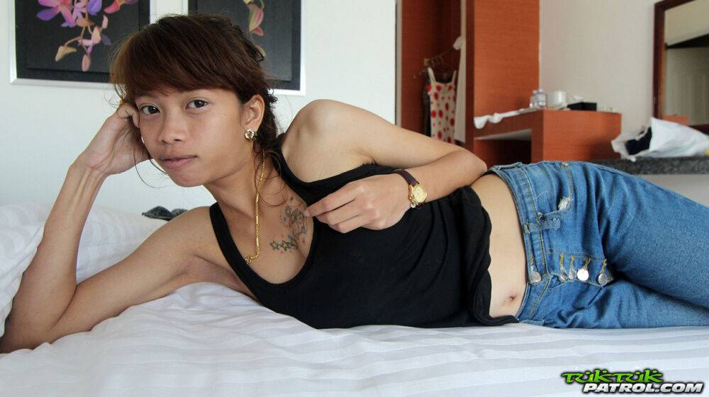Adorable Thai girl cups a firm breast while petting her naked pussy - #14