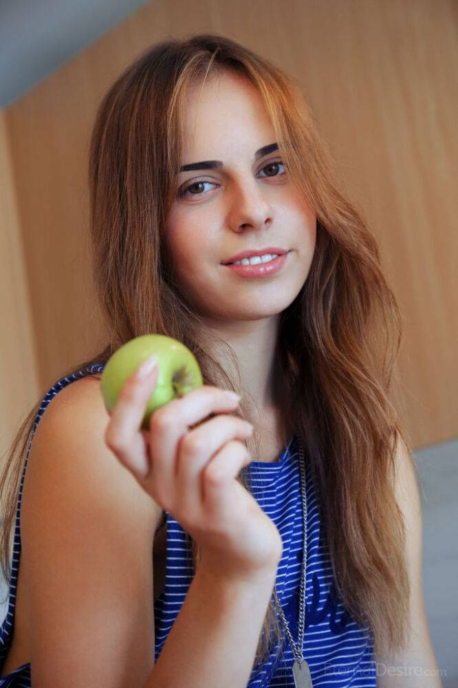 Sexy teen girl Gracie A puts down an apple before fingering her trimmed pussy - #11