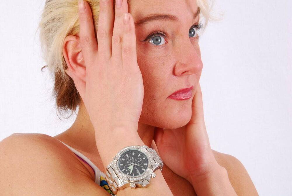 Blue-eyed blonde Lilly models a huge metal watch during safe for work action - #11