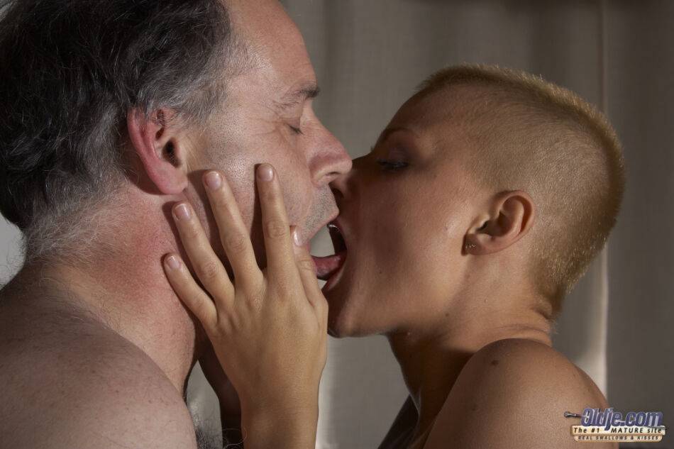Punk girl with a close cropped buzz cut gives an old man a ball licking BJ - #7