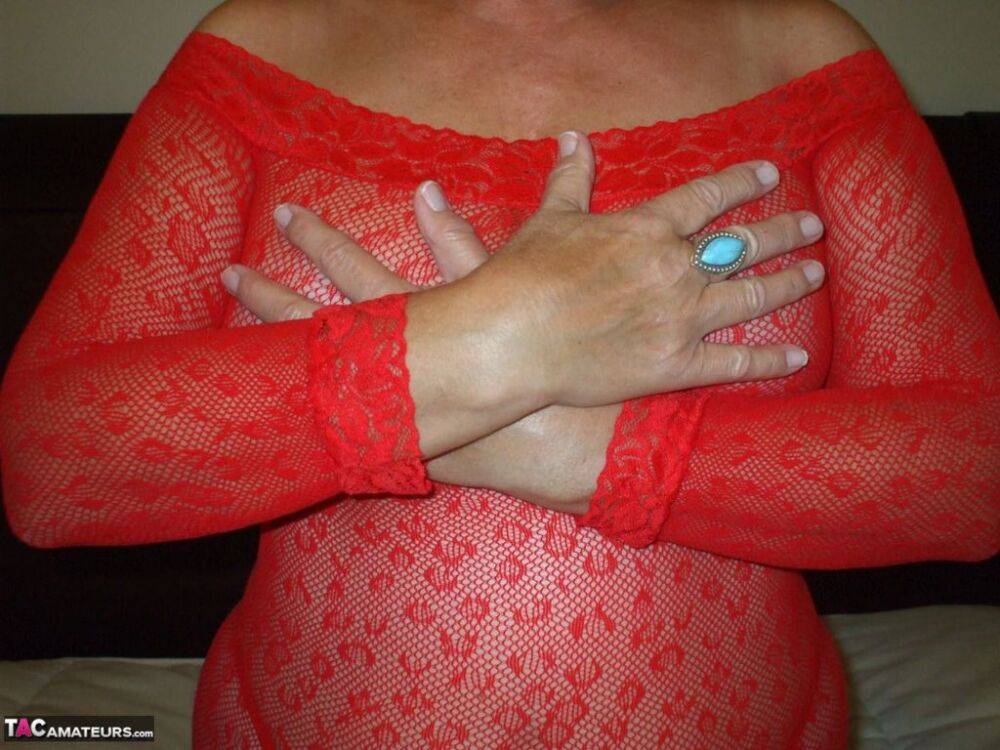 Older amateur Busty Bliss sucks on a finger while modelling sheer lingerie - #2