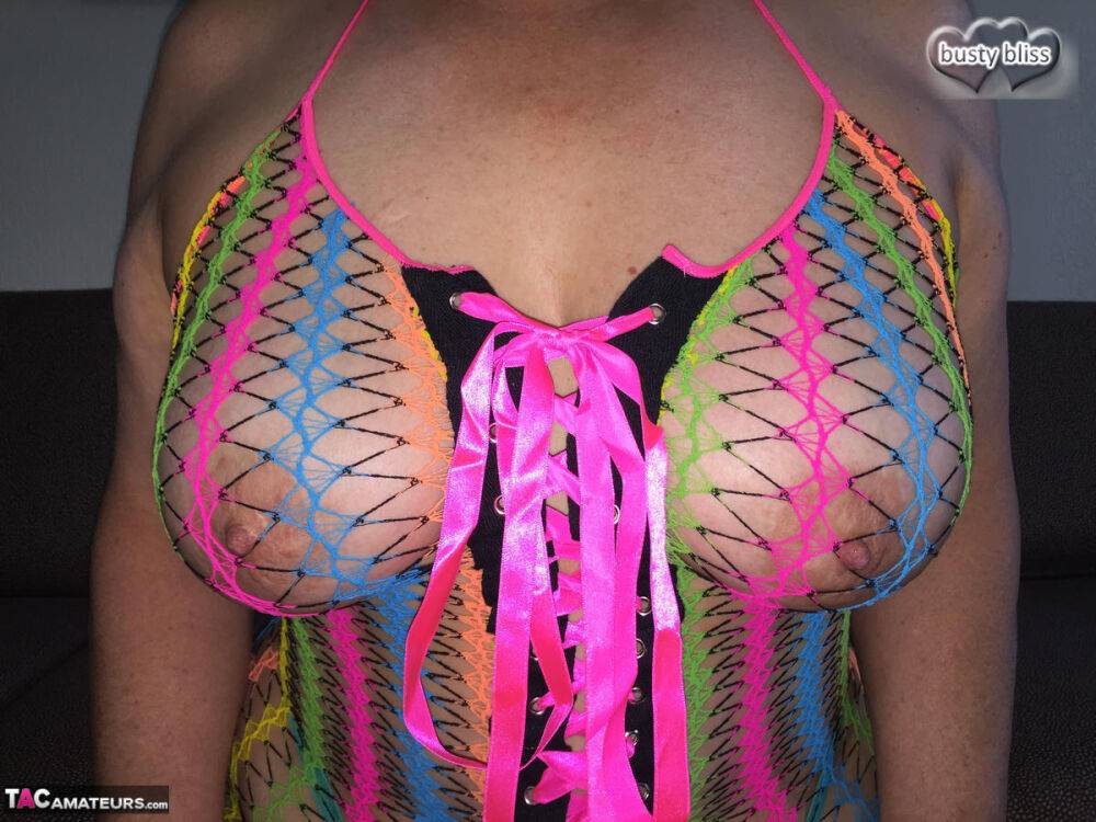 Older amateur Busty Bliss models see-through swimwear during selection - #10