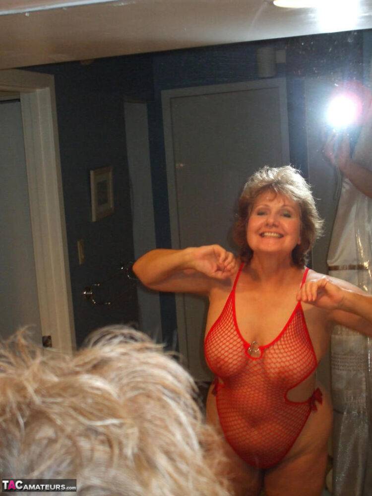 Aged lady Busty Bliss gives the bird wearing see thru lingerie in bathroom - #16