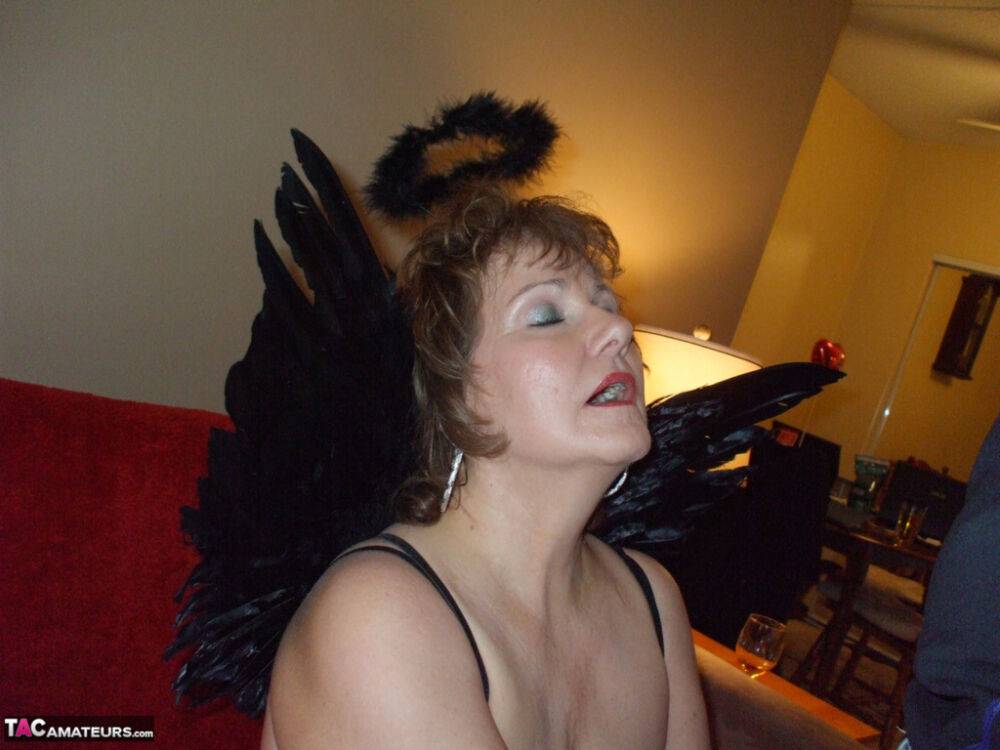 Mature amateur Busty Bliss sports a halo and angel wings while giving head - #13