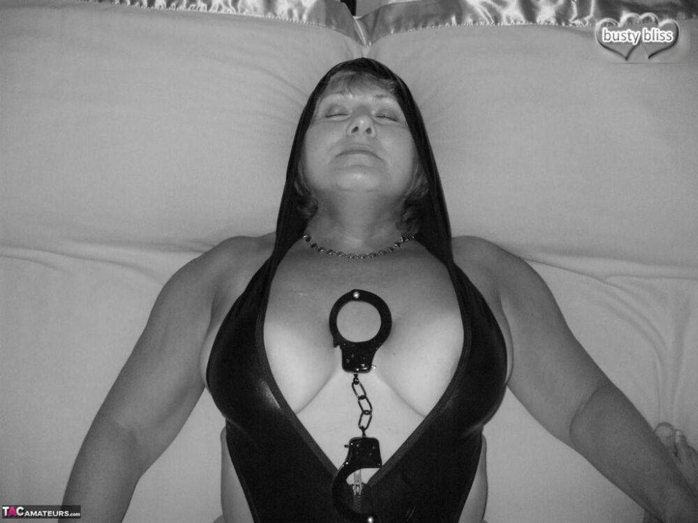 Mature woman Busty Bliss is handcuffed before showing her big natural tits - #14