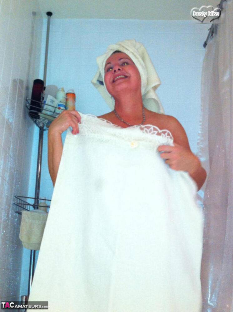 Aged amateur Busty Bliss displays her totally naked body while taking a shower - #4