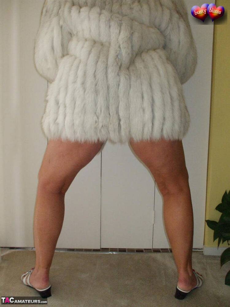 Mature amateur Busty Bliss frees her tan lined tits from a bra and fur coat - #5