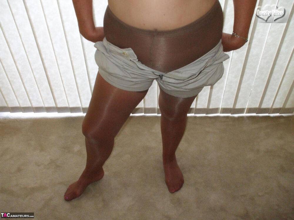 Middle-aged amateur Busty Bliss displays her tan lined tits in pantyhose - #16