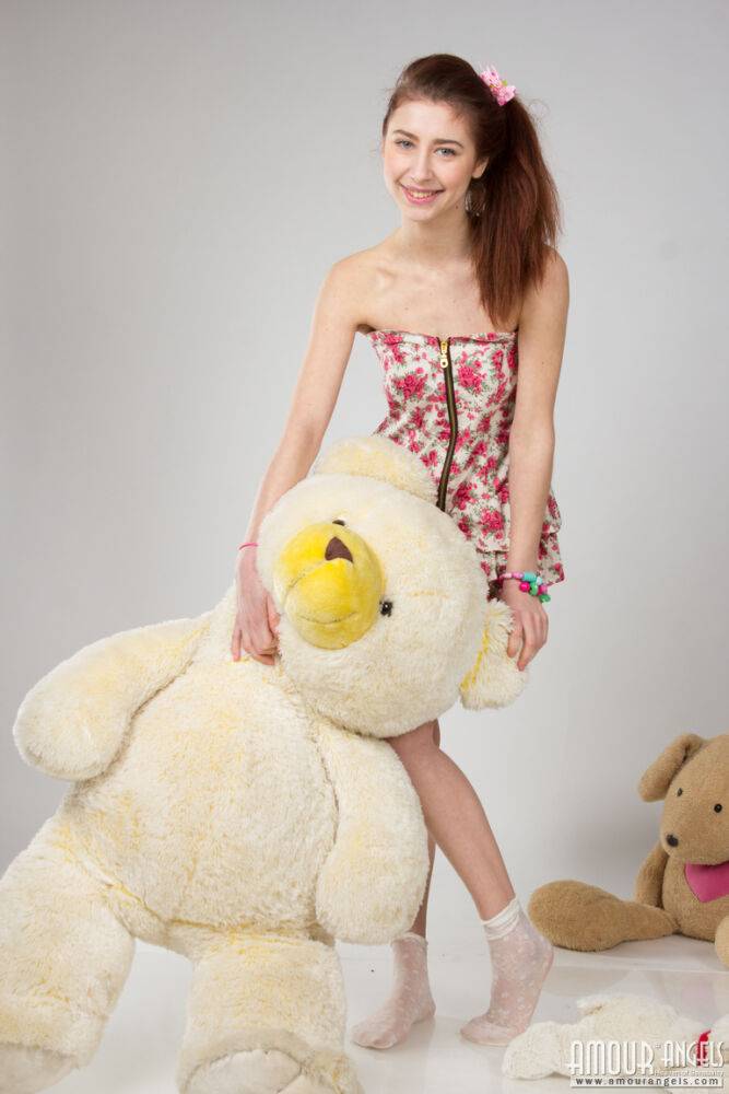 Skinny teen confidently models in the nude with her stuffed toys - #7