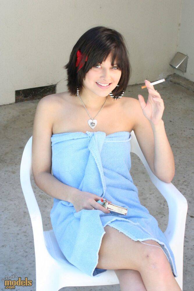 Brunette MILF Ellie Idol frees her naked body from bath towel while smoking - #3