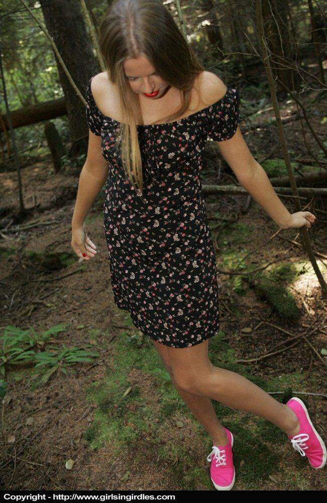 Blonde amateur models nude in nylons before dressing in the woods - #2