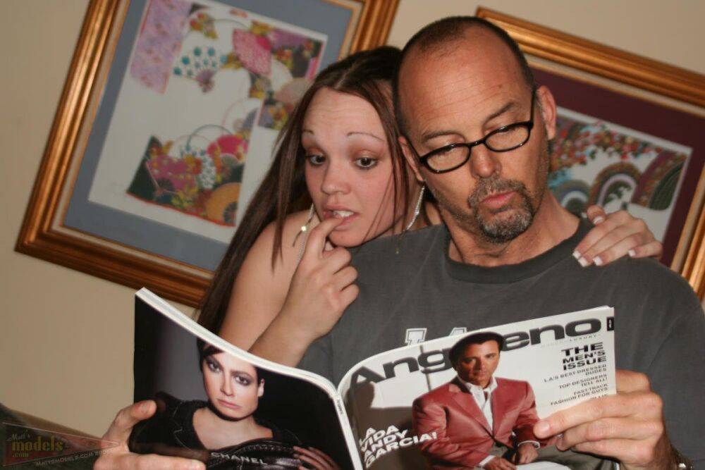 Amateur chick Krystal reads a magazine while sitting naked on a man's lap - #7