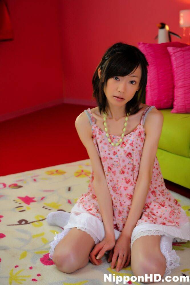 Petite Japanese girl with a pretty face models non nude in knee socks - #9