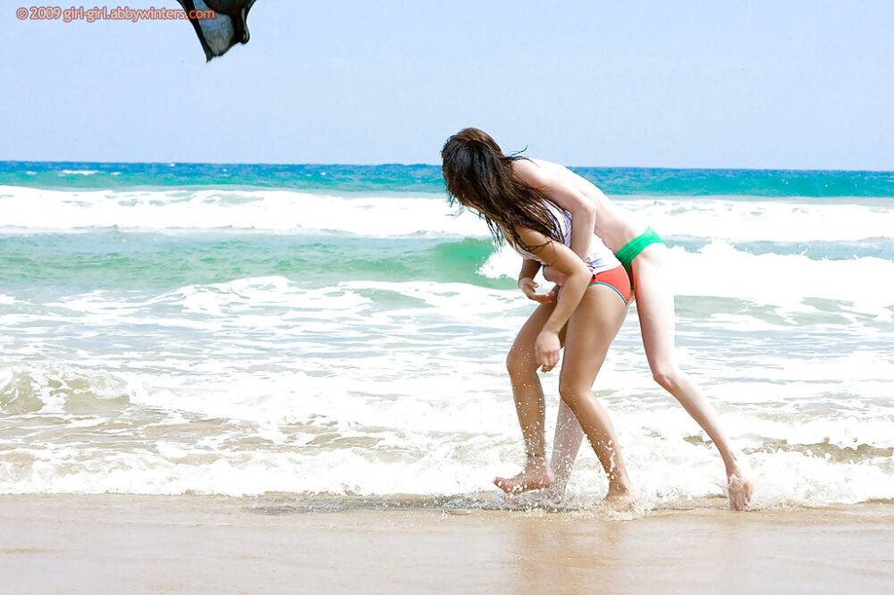 Amateur models Carly T and Silvie bare naked teen bodies at the beach - #9