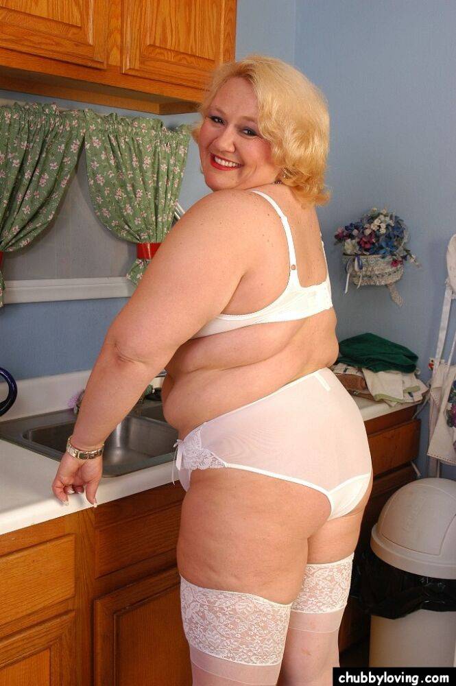 Older fat lady Britany models white stockings and underwear in the kitchen - #13