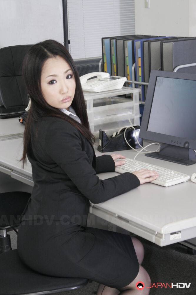 Japanese secretary Ai Mizushima models non nude at work in business attire - #1