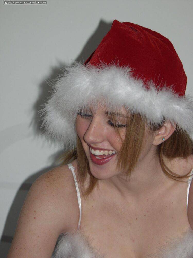 First timer parts her moist pussy in stockings after removing Christmas garb - #16