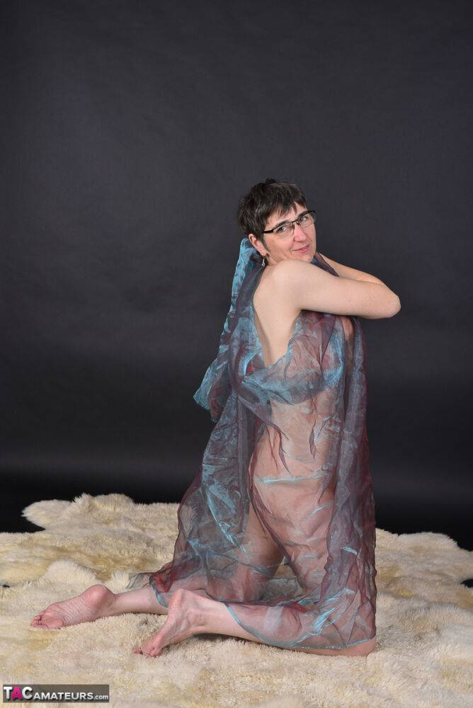 Middle-aged amateur models totally naked while wrapped up in sheer fabric - #3
