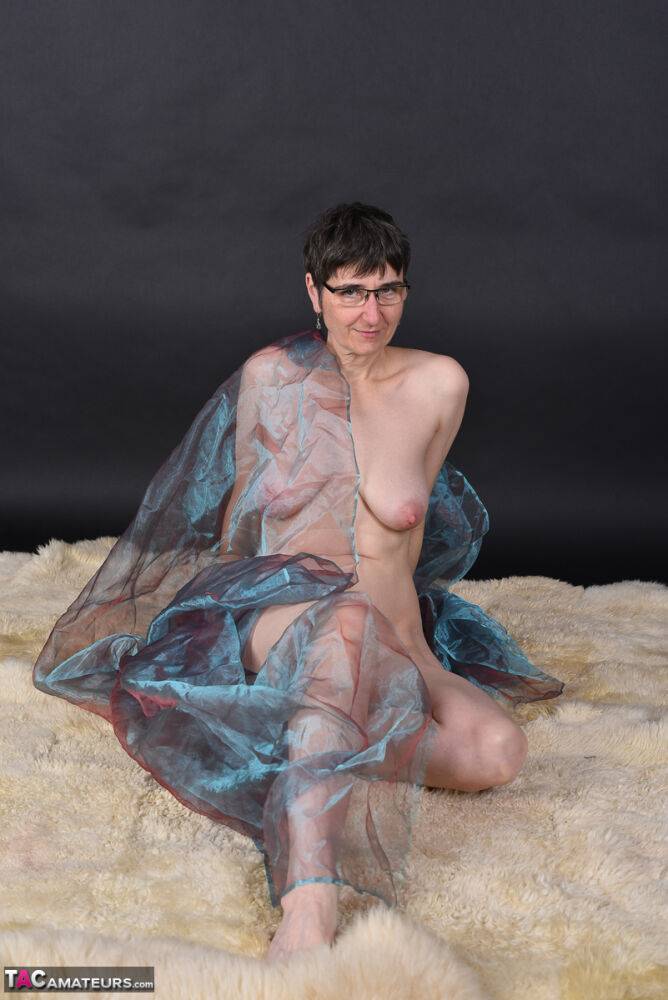 Middle-aged amateur models totally naked while wrapped up in sheer fabric - #11