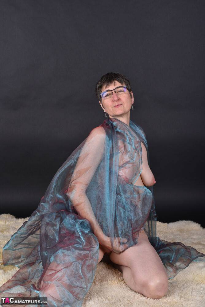 Middle-aged amateur models totally naked while wrapped up in sheer fabric - #8