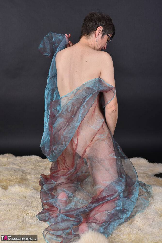 Middle-aged amateur models totally naked while wrapped up in sheer fabric - #6