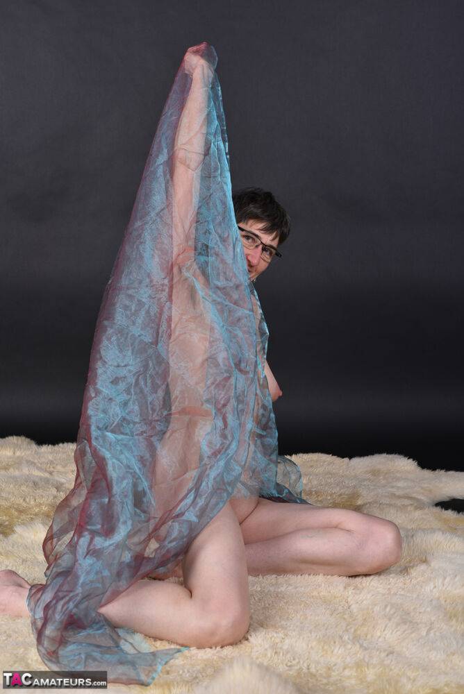 Middle-aged amateur models totally naked while wrapped up in sheer fabric - #14