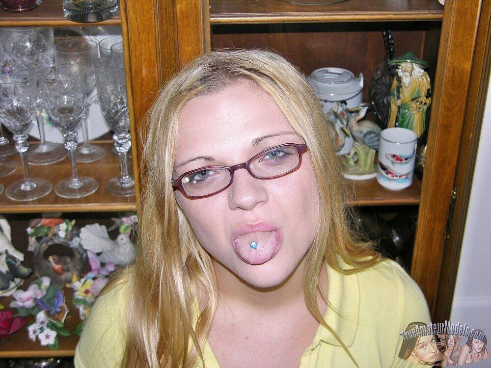 Teen amateur sticks out her pierced tongue while having sex in glasses - #9