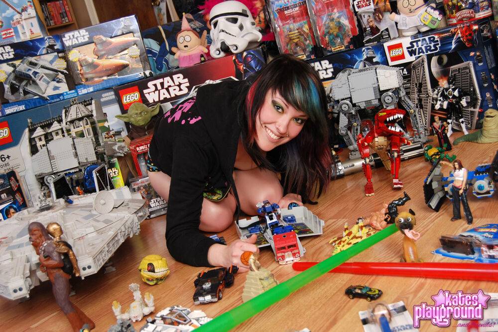 Young amateur Sabrina models for a non-nude shoot amid collectible toys - #6