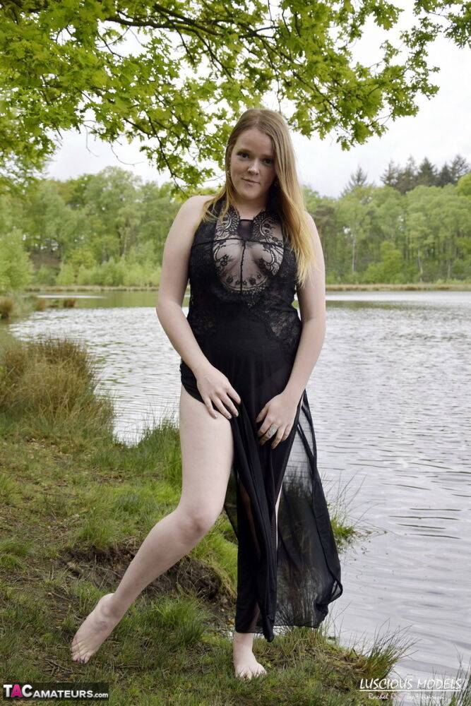 Redheaded amateur Luscious Models models lingerie while in a lake - #16