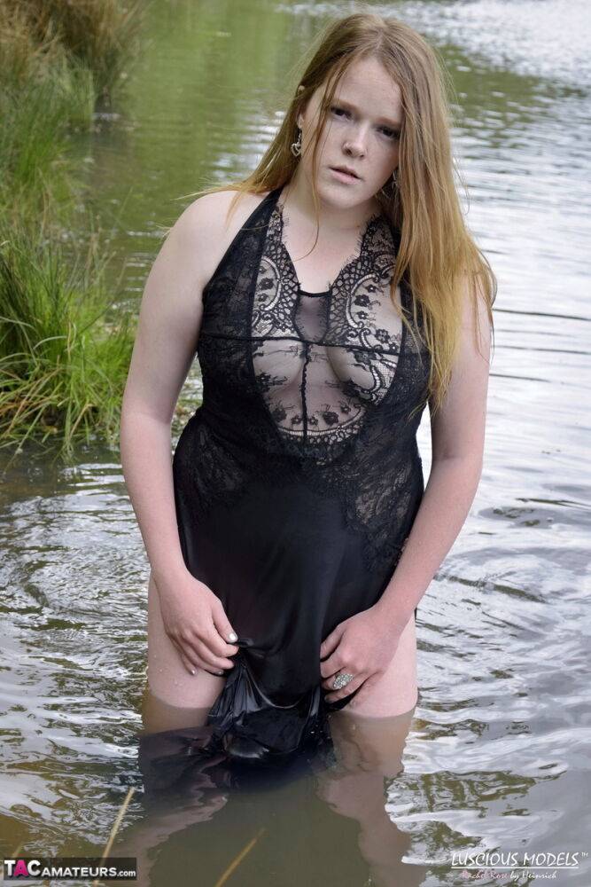 Redheaded amateur Luscious Models models lingerie while in a lake - #11