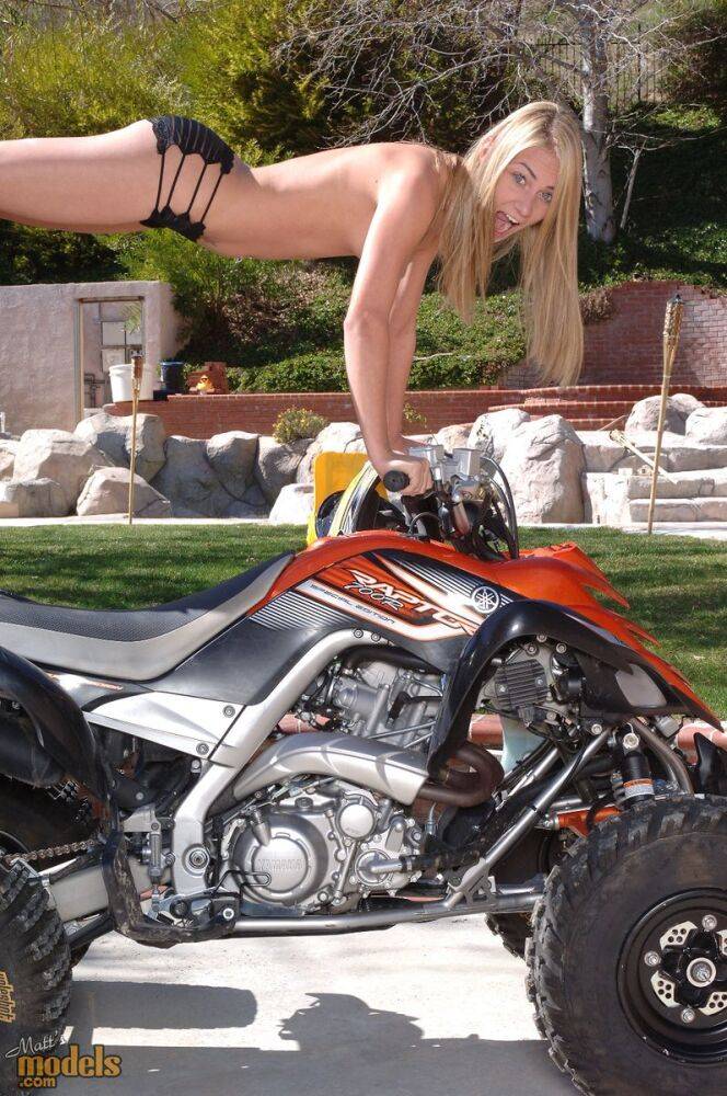 Blonde amateur Tyler Stevenz blows a kiss after posing nude on a four wheeler - #14