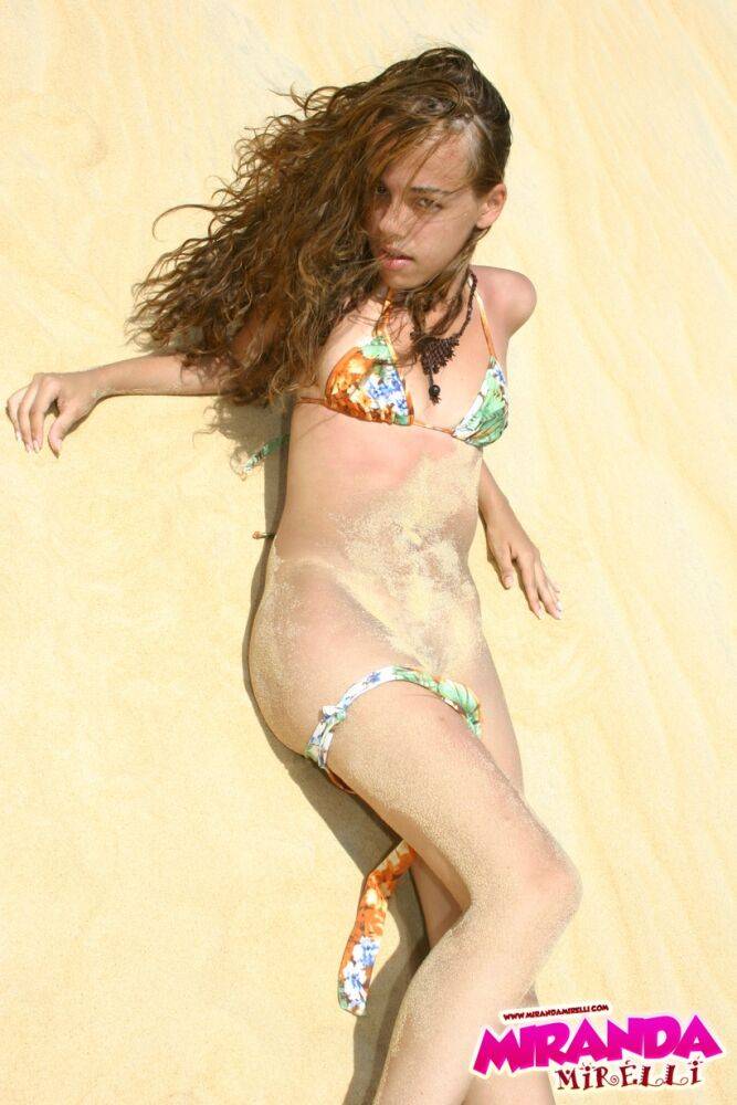 Latina teen Miranda Mirelli models in a bikini atop a sand dune - #7