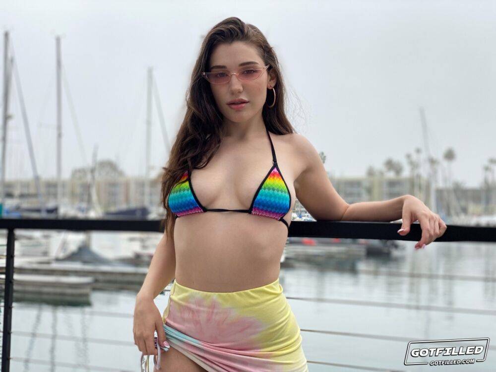 Brunette chick Lily Lou models a bikini at a marina before rough sex inside - #4