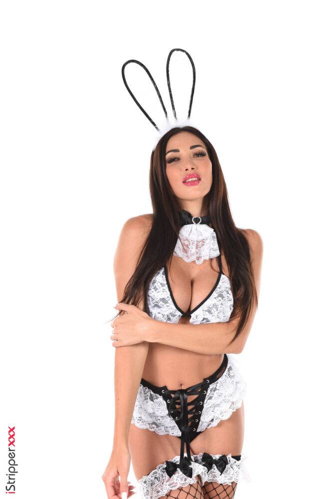 Beautiful brunette Clea Gaultier models a White Rabbit outfit before dildoing - #14