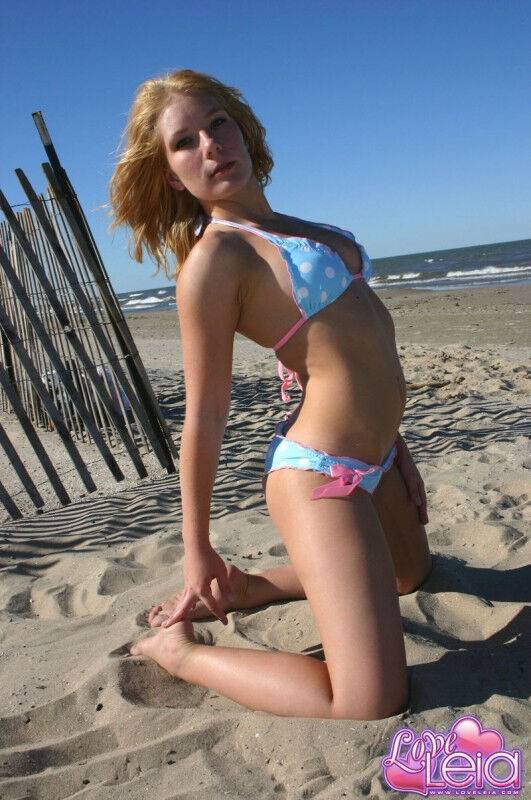 Teen amateur models a bikini on a beach during a non nude solo shoot - #2