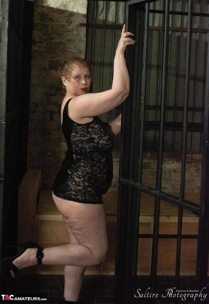 British fatty Posh Sophia models fetish wear in and out of a jail cell - #6