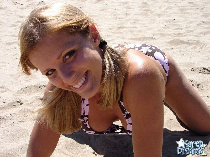 Blonde amateur Karen models her new bikini on a volleyball pitch - #7