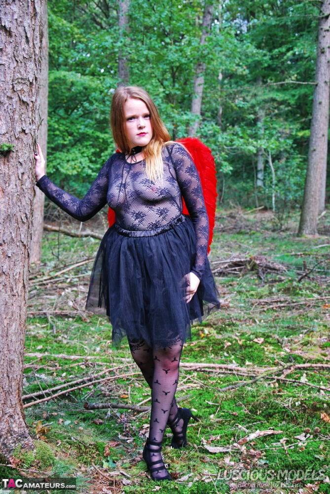 Amateur woman Luscious Models poses in the forest in a cosplay clothing - #16