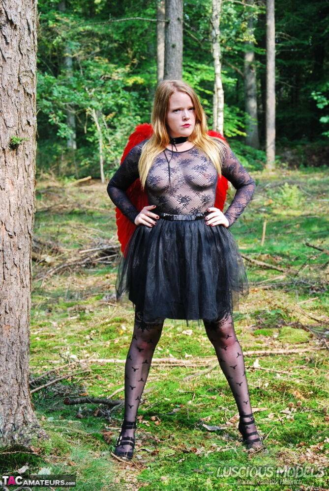 Amateur woman Luscious Models poses in the forest in a cosplay clothing - #15