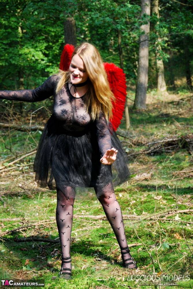 Amateur woman Luscious Models poses in the forest in a cosplay clothing - #1