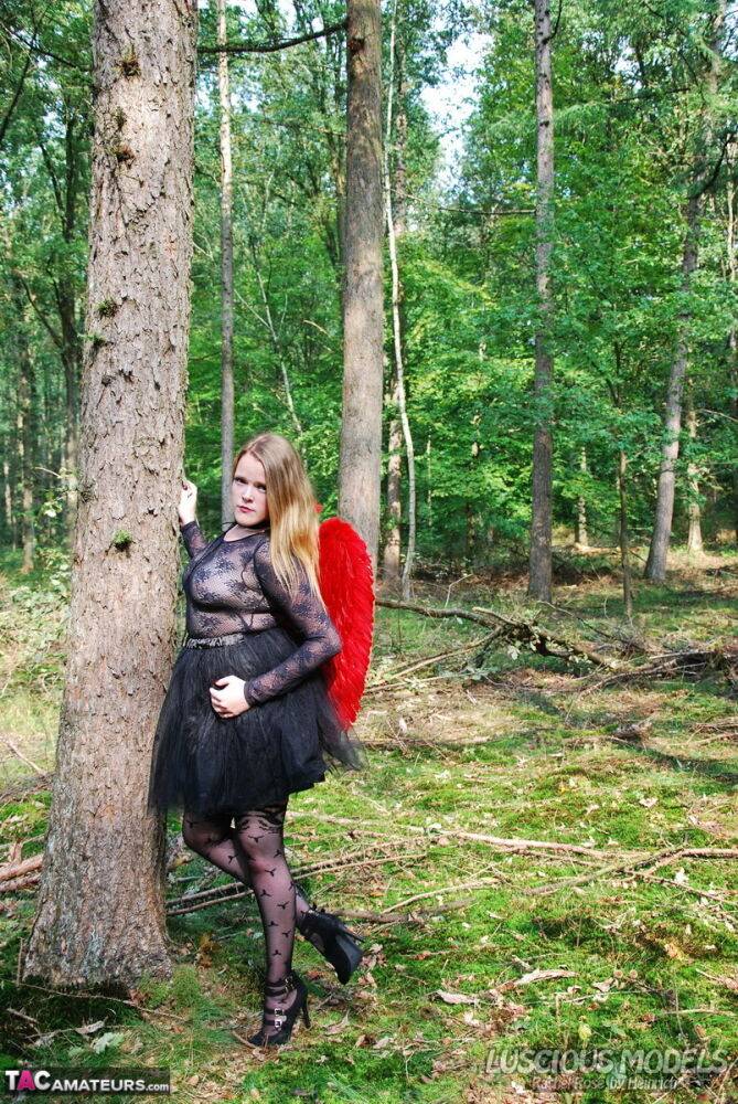 Amateur woman Luscious Models poses in the forest in a cosplay clothing - #9