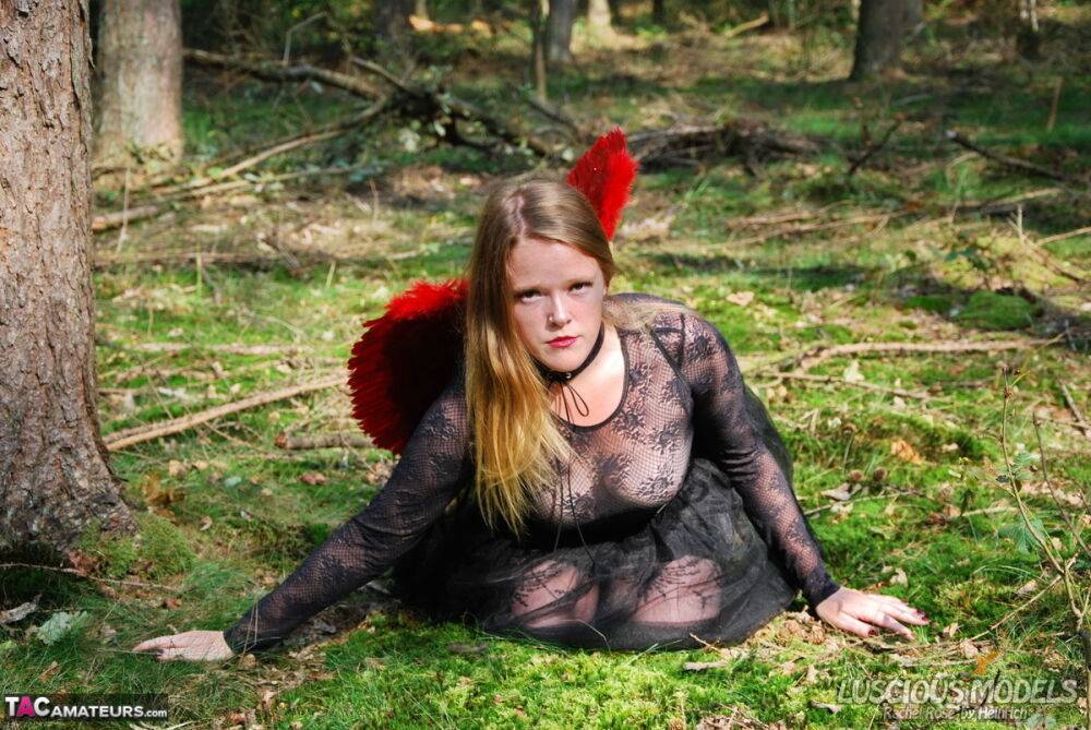 Amateur woman Luscious Models poses in the forest in a cosplay clothing - #13