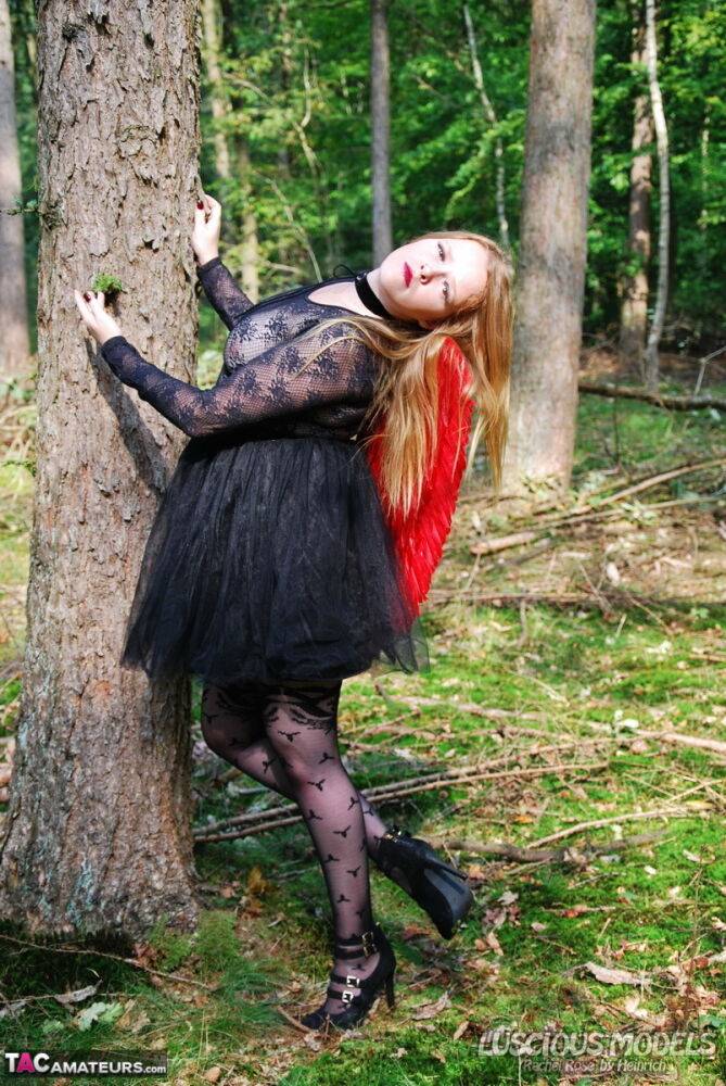 Amateur woman Luscious Models poses in the forest in a cosplay clothing - #12