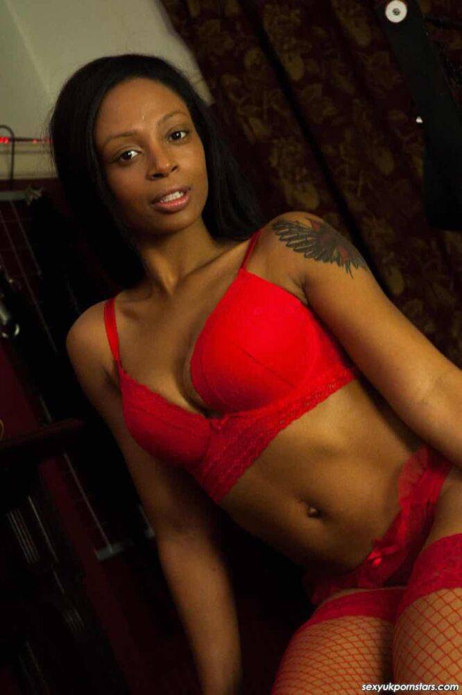 British black girl Lola Marie models red lingerie and matching stockings - #8