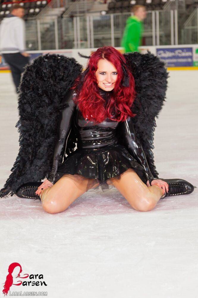 Redhead amateur Lara Larsen models non nude in latex attire with wings - #8