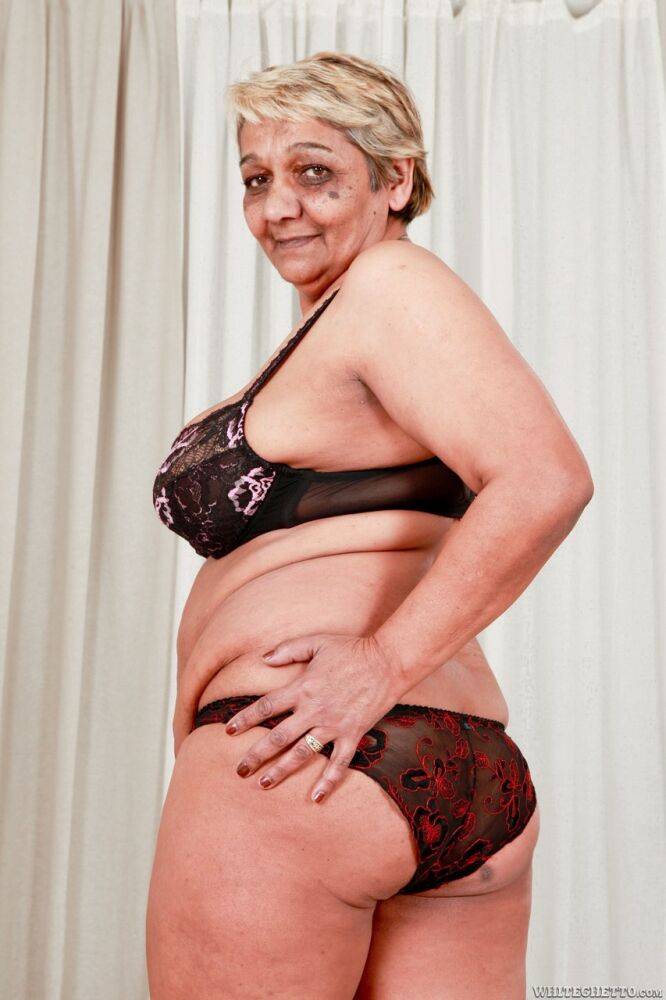 Fat granny Evika models in her bra and underwear during solo action - #13