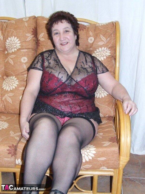 Mature BBW Kinky Carol models sexy lingerie in mesh stockings and heels - #4